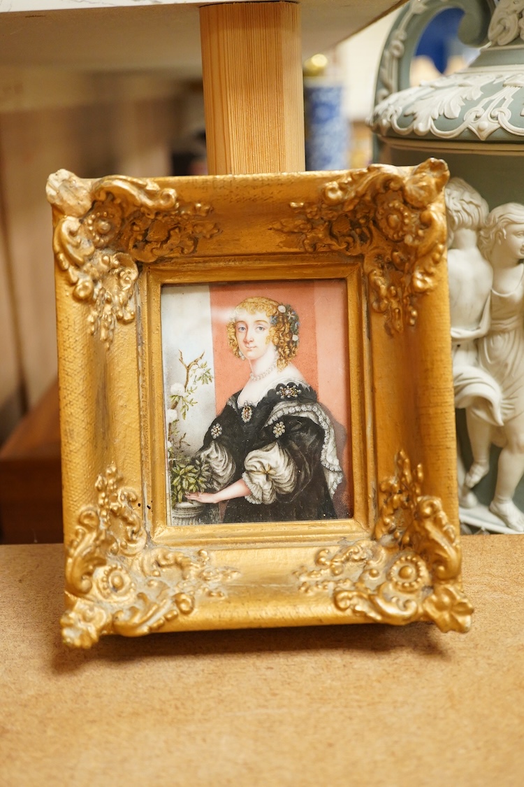 19th century School, Portrait miniature of a lady wearing 17th century dress beside flowers, watercolour on ivory, ornate gilt frame, 9.5 x 7cm IVORY SUBMISSION CQM7G494